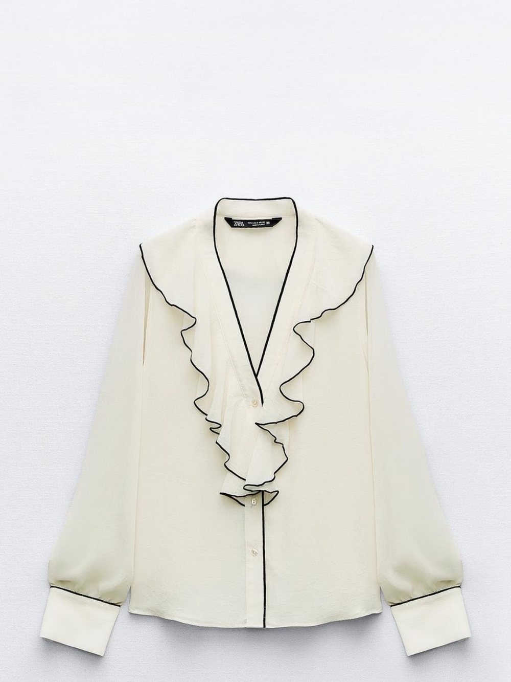 Zara Cream Ruffle Blouse with Black Piping